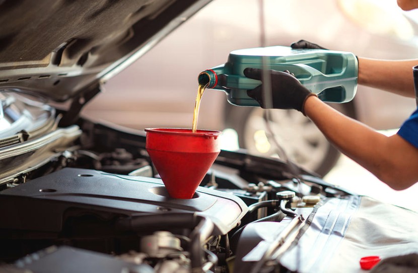 Do you have to let your engine cool before adding oil?