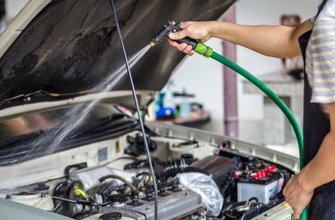 Is it OK to hose down your car engine?