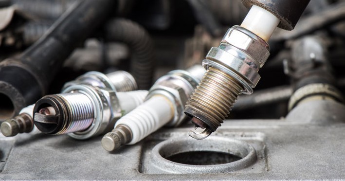 can bad spark plugs cause transmission problems