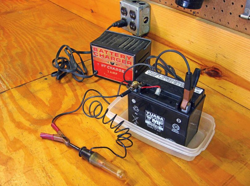 Can you charge a motorcycle battery with a car battery?